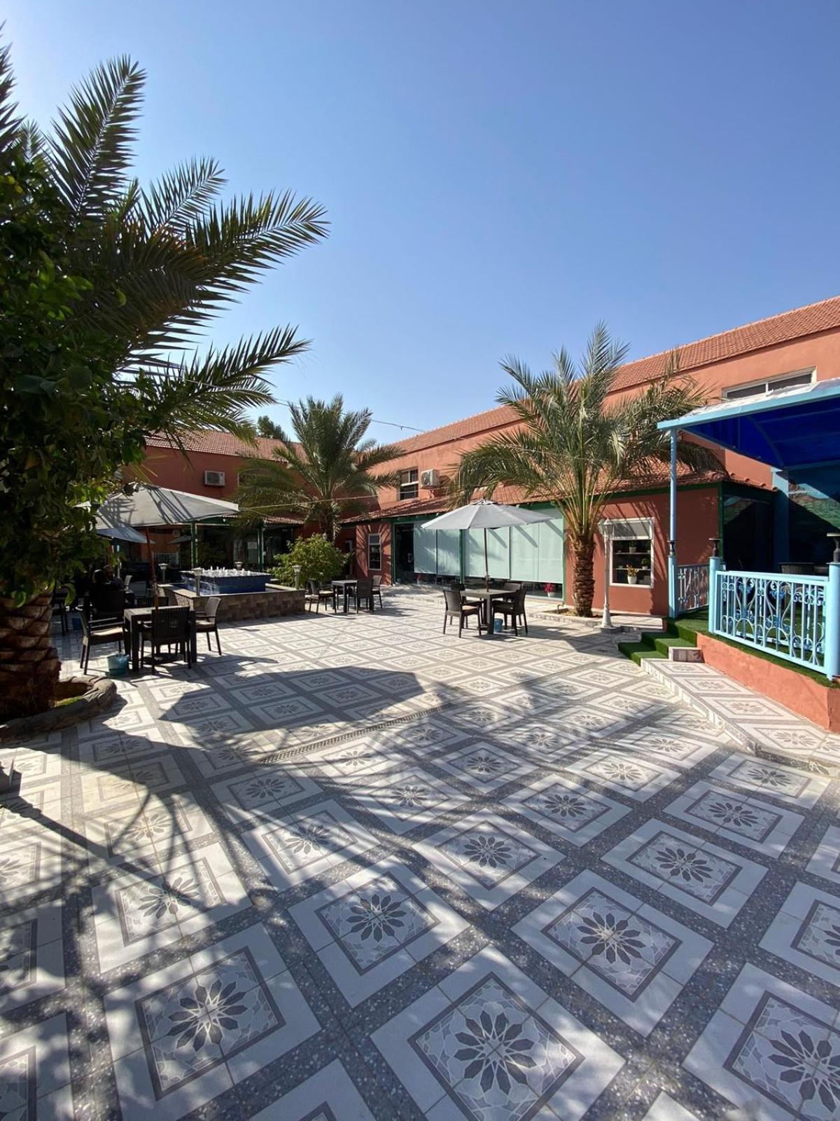 فندق ادوماتو Adomato Hotel Dawmat al-Jandal Bagian luar foto